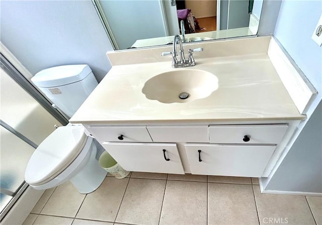 26221 Germantown Dr, Menifee, CA 92586 - bathroom featuring tile patterned flooring, toilet, and vanity