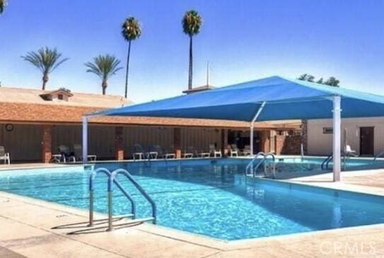 26221 Germantown Dr, Menifee, CA 92586 - community pool with a patio
