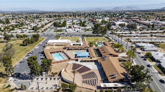 26221 Germantown Dr, Menifee, CA 92586 - aerial view of property's location with a pool and a mountainous background