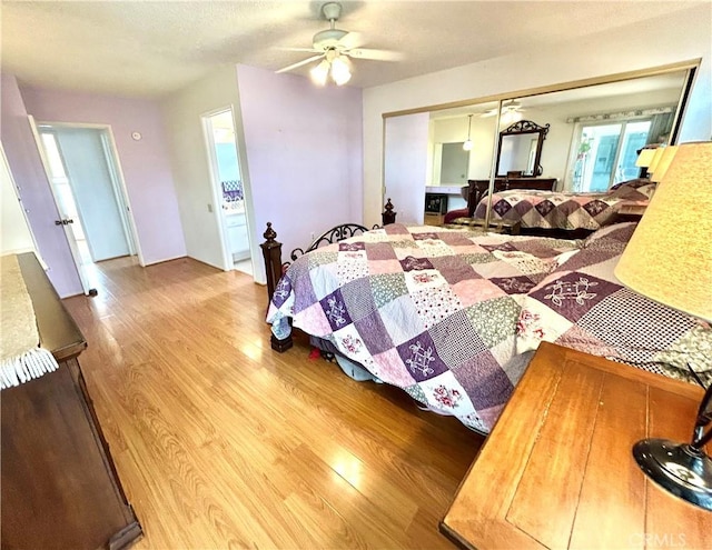 26221 Germantown Dr, Menifee, CA 92586 - bedroom with wood finished floors and a ceiling fan