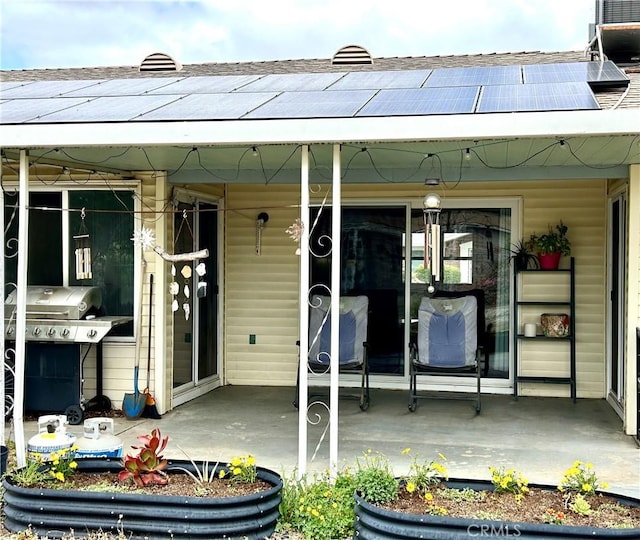 26221 Germantown Dr, Menifee, CA 92586 - back of property featuring a porch, central air condition unit, and solar panels