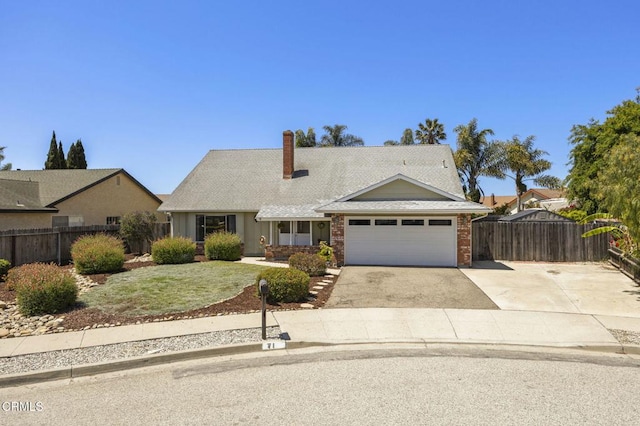 view of front of home featuring fence, a garage, board and batten siding, a chimney, and driveway