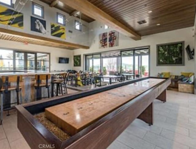 94 Jaripol Cir, Rancho Mission Viejo, CA 92694 - recreation room with wooden ceiling, beam ceiling, tile patterned flooring, and high vaulted ceiling