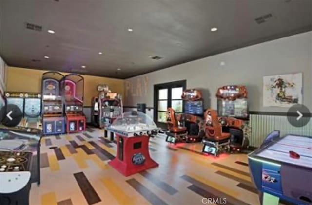 rec room featuring french doors, visible vents, and recessed lighting
