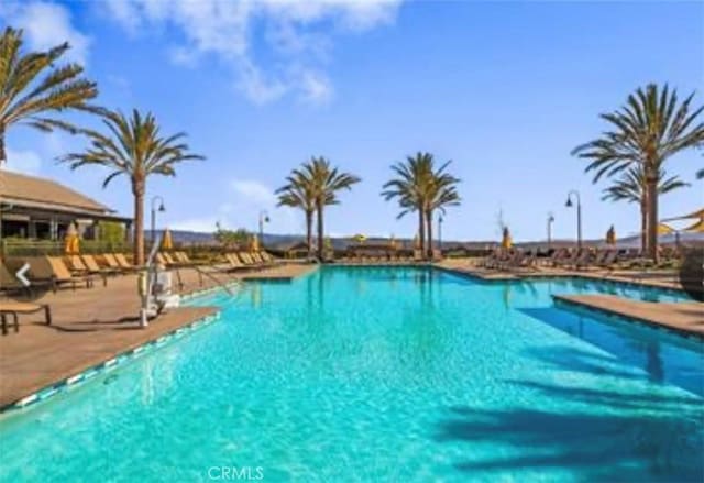 community pool featuring a patio