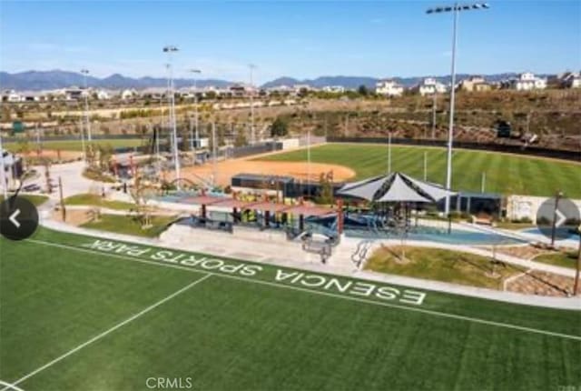 surrounding community with a mountain view
