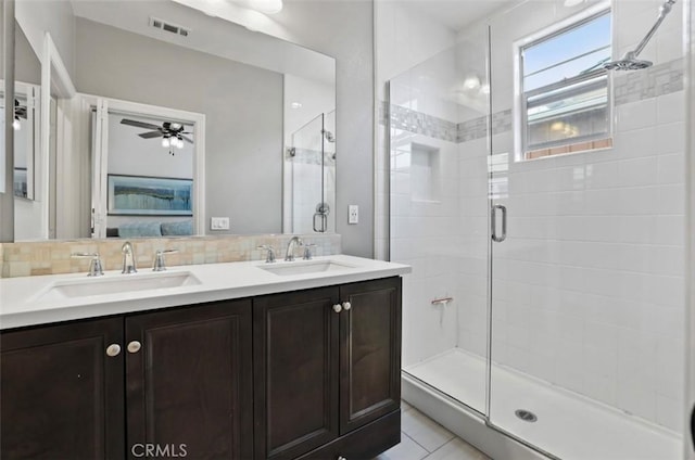 94 Jaripol Cir, Rancho Mission Viejo, CA 92694 - full bathroom with a stall shower, ensuite bath, a ceiling fan, double vanity, and backsplash