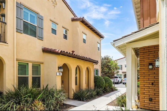 94 Jaripol Cir, Rancho Mission Viejo, CA 92694 - view of side of property with stucco siding