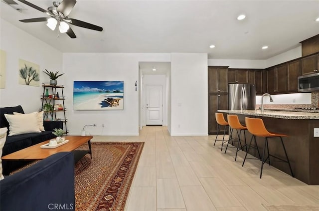 94 Jaripol Cir, Rancho Mission Viejo, CA 92694 - living area featuring ceiling fan and recessed lighting