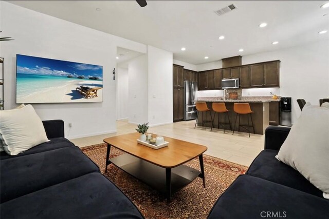 94 Jaripol Cir, Rancho Mission Viejo, CA 92694 - living room featuring recessed lighting and baseboards
