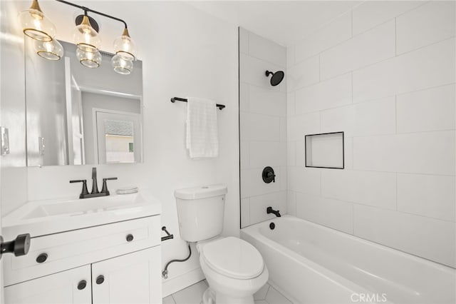bathroom with baseboards, vanity, washtub / shower combination, and toilet