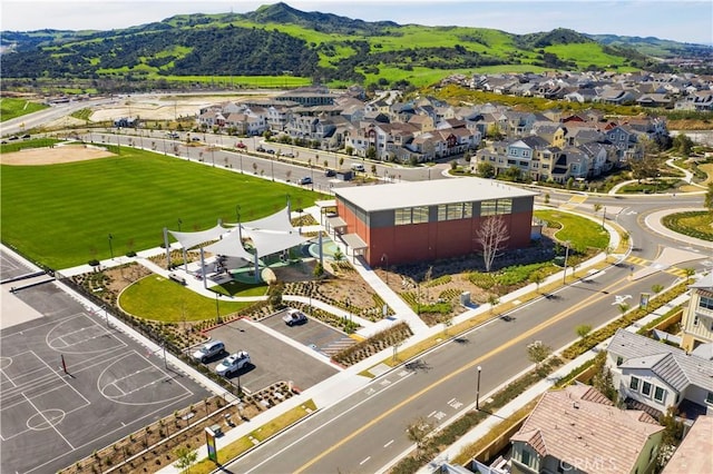 aerial view featuring a mountain view and a residential view