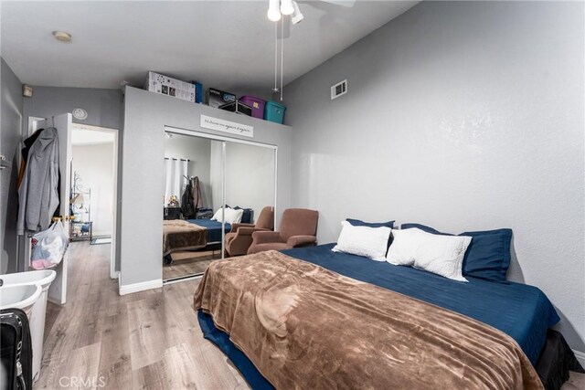 25448 Wedmore Dr, Moreno Valley, CA 92553 - bedroom featuring wood finished floors, visible vents, a ceiling fan, a closet, and baseboards