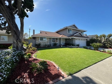 16591 Busby Ln, Huntington Beach, CA 92647 - traditional-style home featuring stone siding and a garage