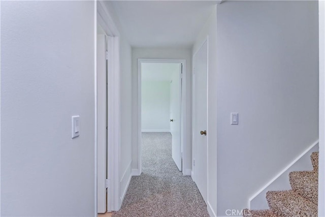 16591 Busby Ln, Huntington Beach, CA 92647 - hallway with light carpet and baseboards