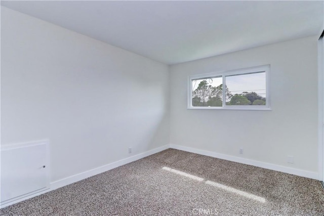 16591 Busby Ln, Huntington Beach, CA 92647 - spare room featuring carpet and baseboards