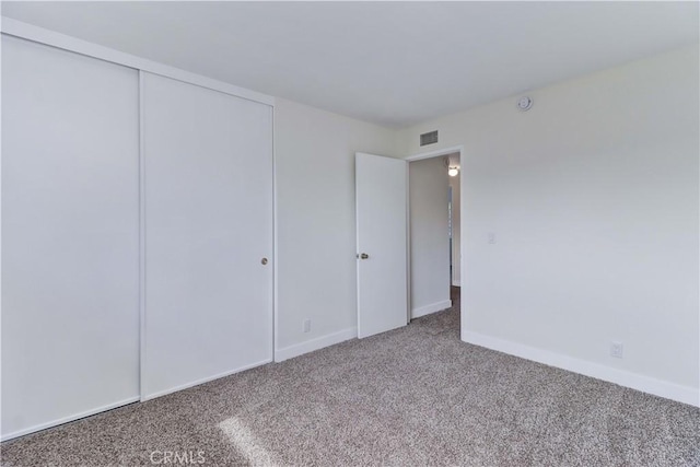 16591 Busby Ln, Huntington Beach, CA 92647 - unfurnished bedroom with carpet floors, baseboards, and a closet