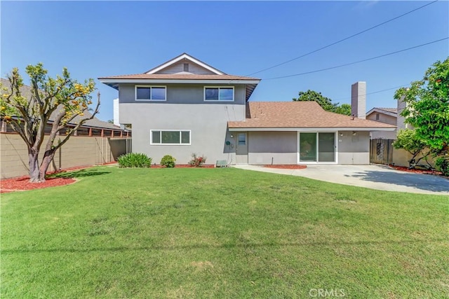 16591 Busby Ln, Huntington Beach, CA 92647 - rear view of property featuring stucco siding and a shingled roof