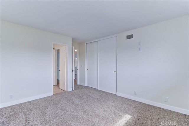 16591 Busby Ln, Huntington Beach, CA 92647 - unfurnished bedroom featuring light colored carpet, a closet, and baseboards