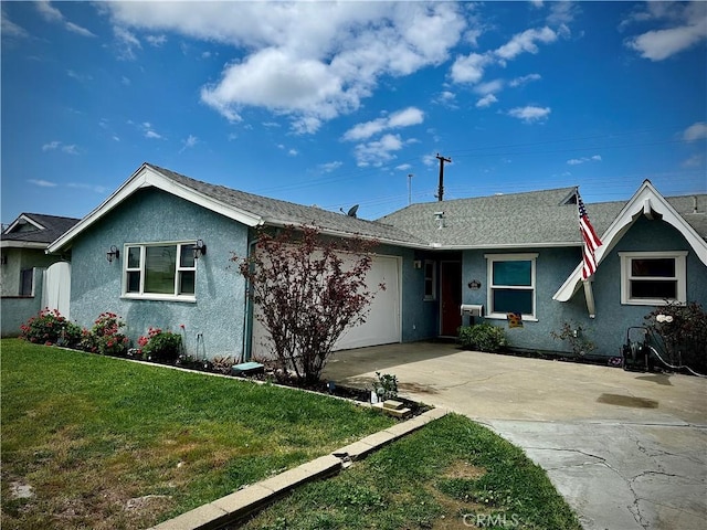 ranch-style house featuring concrete driveway, a shingled roof, an attached garage, stucco siding, and a front lawn