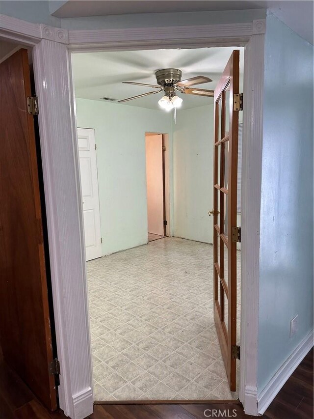 corridor featuring french doors