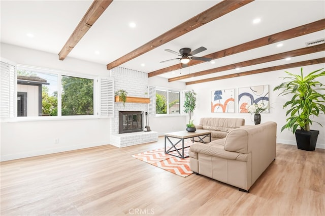 2430 Van Wick St, Inglewood, CA 90303 - living area featuring recessed lighting, a fireplace, visible vents, baseboards, and wood finished floors
