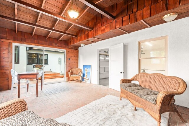 2430 Van Wick St, Inglewood, CA 90303 - interior space featuring wood ceiling, brick floor, wood walls, and beamed ceiling
