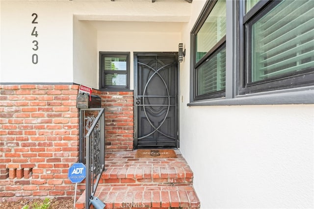 2430 Van Wick St, Inglewood, CA 90303 - doorway to property with stucco siding and brick siding