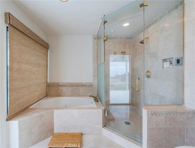 bathroom featuring recessed lighting, tile patterned floors, a garden tub, and a stall shower