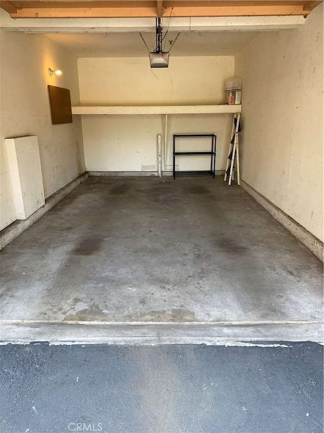 2800 Keller Dr Unit 34, Tustin, CA 92782 - garage featuring a garage door opener