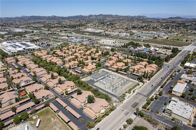 drone / aerial view featuring a mountain view and a residential view