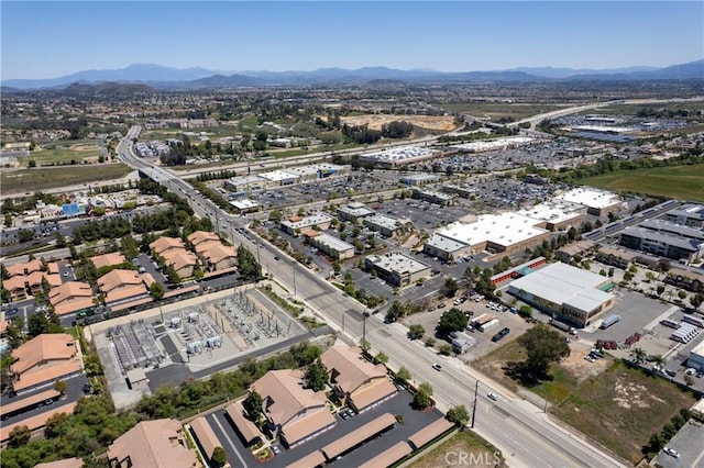 drone / aerial view featuring a mountain view