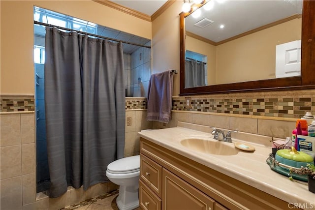 1843 Cerritos Ave, Long Beach, CA 90806 - bathroom featuring tile walls, crown molding, tile patterned floors, toilet, and vanity