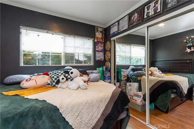 1843 Cerritos Ave, Long Beach, CA 90806 - bedroom with crown molding, wood finished floors, and a closet