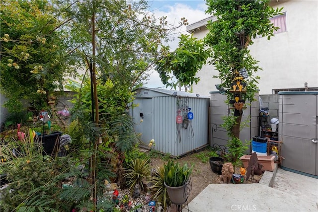 1843 Cerritos Ave, Long Beach, CA 90806 - view of yard with a storage unit, an outbuilding, and fence
