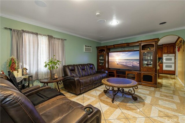 1843 Cerritos Ave, Long Beach, CA 90806 - living room featuring arched walkways, light tile patterned floors, and crown molding