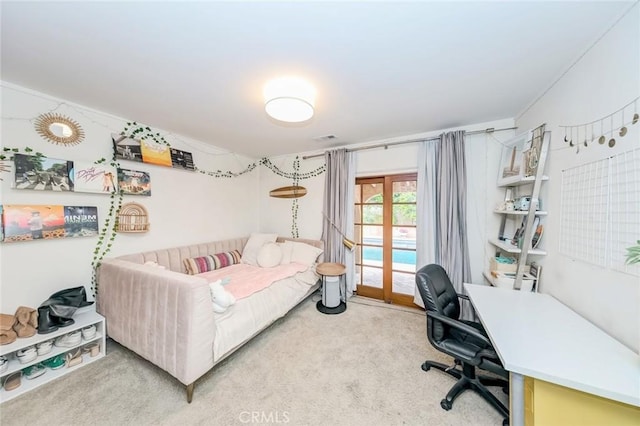 bedroom with carpet floors, access to outside, french doors, and visible vents