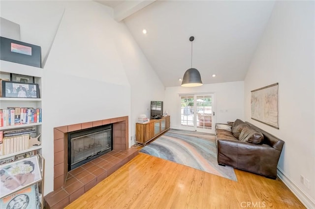 516 Orange Grove Ave, South Pasadena, CA 91030 - living area with beam ceiling, wood finished floors, a fireplace, high vaulted ceiling, and recessed lighting