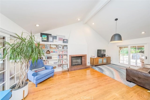 516 Orange Grove Ave, South Pasadena, CA 91030 - living room featuring wood finished floors, beamed ceiling, high vaulted ceiling, recessed lighting, and a tiled fireplace