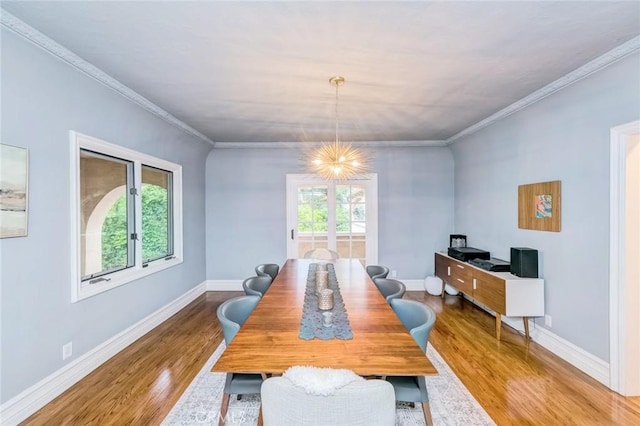 516 Orange Grove Ave, South Pasadena, CA 91030 - dining area featuring baseboards, crown molding, and wood finished floors