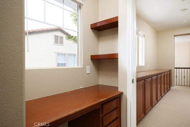 4505 Cresta Babia, San Clemente, CA 92673 - corridor featuring healthy amount of natural light, light carpet, and a textured wall