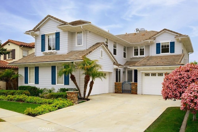 4505 Cresta Babia, San Clemente, CA 92673 - view of front of home with an attached garage, concrete driveway, and a tiled roof