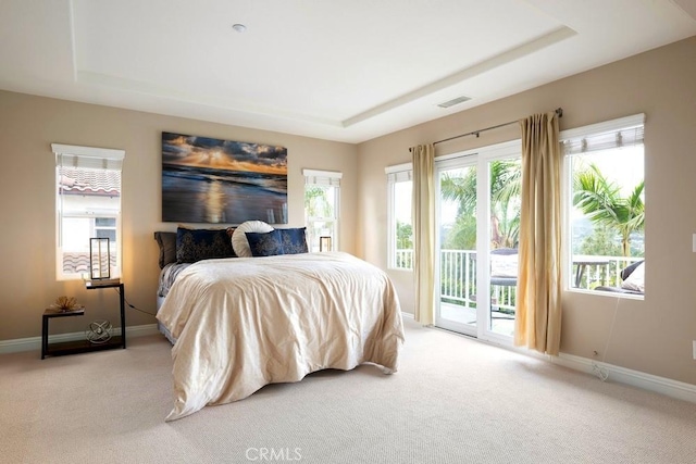 4505 Cresta Babia, San Clemente, CA 92673 - carpeted bedroom featuring a raised ceiling, access to outside, and multiple windows