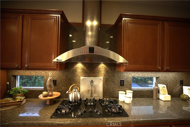 4505 Cresta Babia, San Clemente, CA 92673 - kitchen with wall chimney range hood, black gas cooktop, and tasteful backsplash