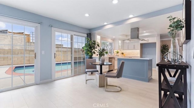 16001 Ballantine Ln, Huntington Beach, CA 92647 - dining area with recessed lighting and light wood-style floors