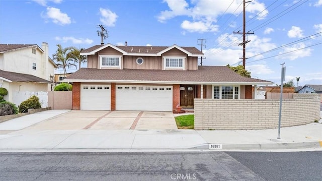 16001 Ballantine Ln, Huntington Beach, CA 92647 - traditional home featuring concrete driveway, an attached garage, and brick siding