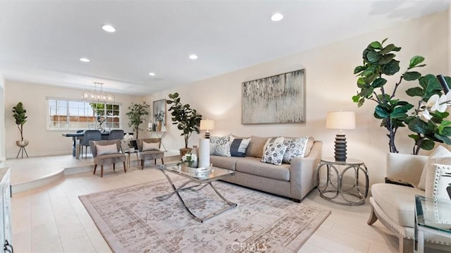 16001 Ballantine Ln, Huntington Beach, CA 92647 - living room featuring recessed lighting, a chandelier, and wood finished floors