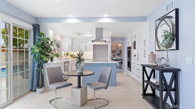 16001 Ballantine Ln, Huntington Beach, CA 92647 - dining area with recessed lighting and light wood-style flooring
