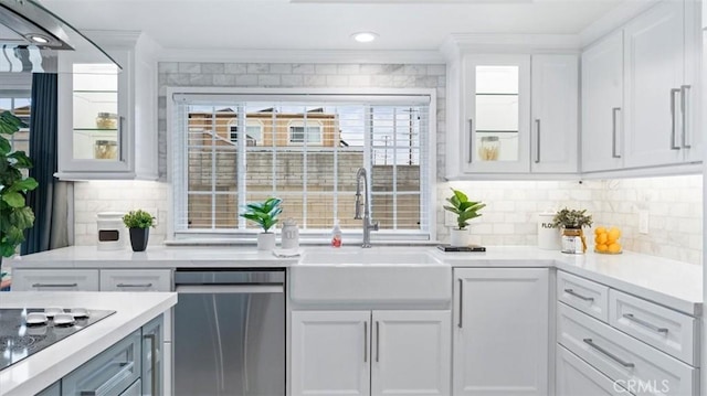 16001 Ballantine Ln, Huntington Beach, CA 92647 - kitchen with dishwasher, crown molding, black electric stovetop, white cabinets, and light countertops