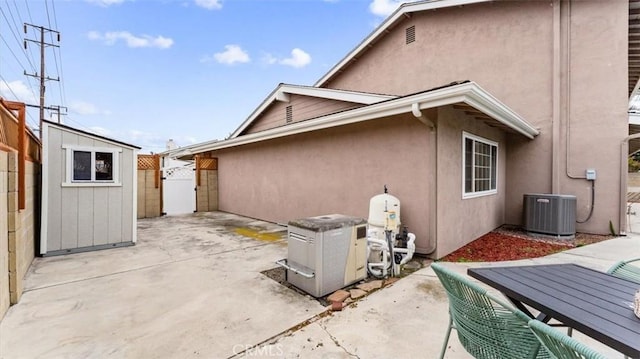 16001 Ballantine Ln, Huntington Beach, CA 92647 - view of patio / terrace featuring a storage shed